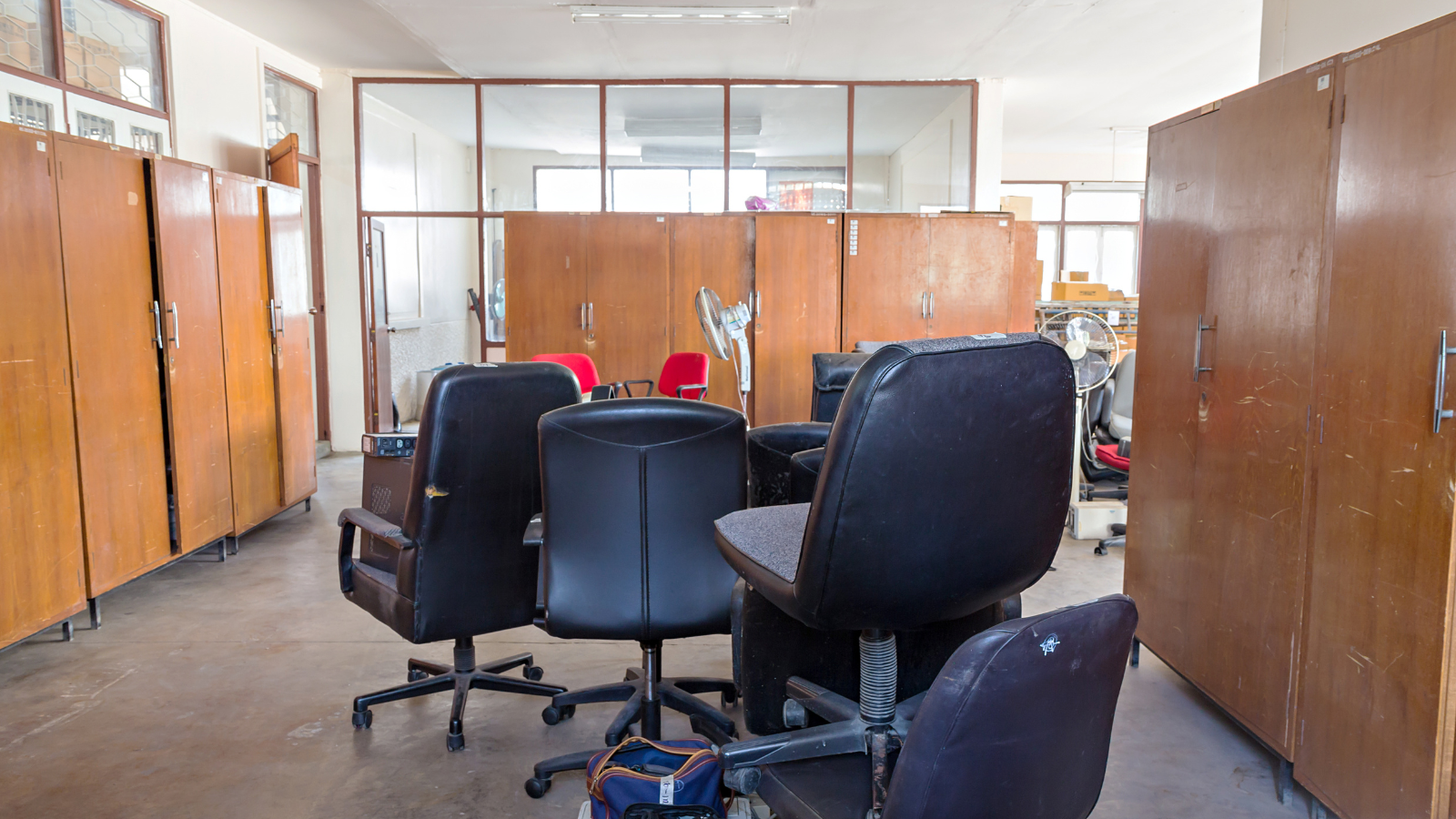 Office chairs in an old office space.